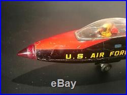 1964 Sears Tomiyama Japan Tin Friction BK-02VF USAF Jet Airplane Toy & Bombs