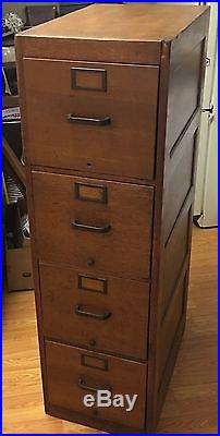 Antique oak filing cabinet 4 drawers Tagged Air Force United States Army
