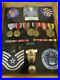 Military_Medals_From_1946_To_1966_14_Medals_And_Patches_Total_Framed_And_An_01_lx
